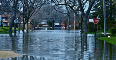 Street Filled with Water Needing Flood Insurance in League City, Houston, Friendswood, TX, Pasadena, TX